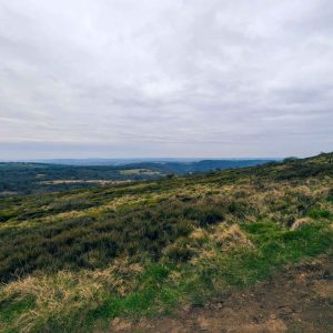 Hilltop path with fields in the distance