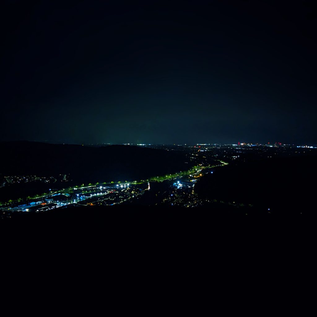 View over valley looking towards Cardiff city centre at night
