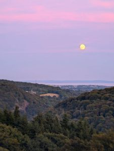 View of the Taff valley with Castell Coch under a full moon