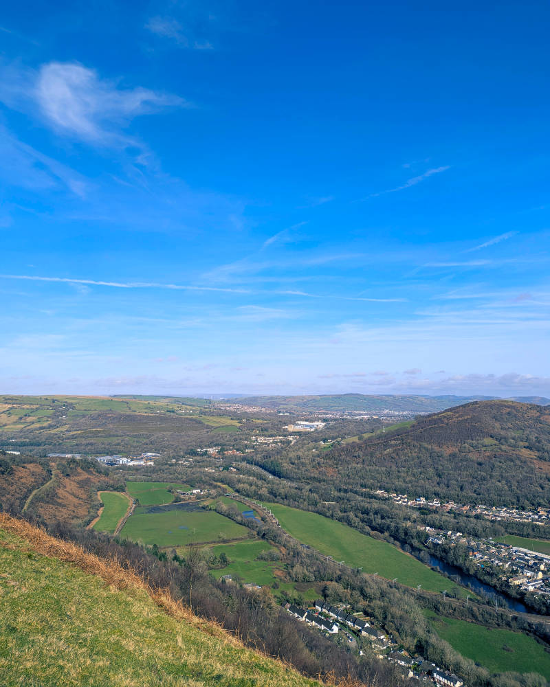 View up the Taff Gorge on a clear day with the Garth on the left and Craig yr Allt on the right.